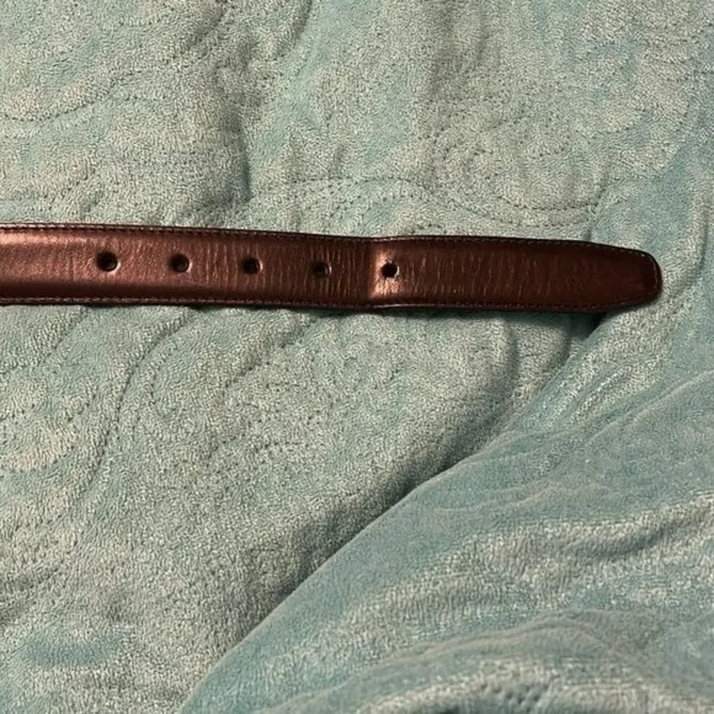 Cole Haan Leather Black Belt men's Size 34. Buckle is solid brass. Good Preowned